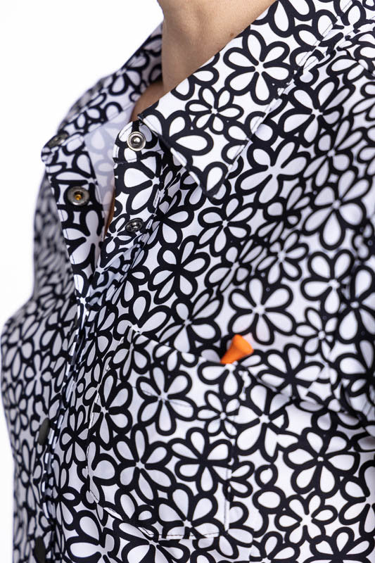 Close front view of the collar and neckline on the Tough in the Rough Short Sleeve Golf Top in Fall Bloom print.