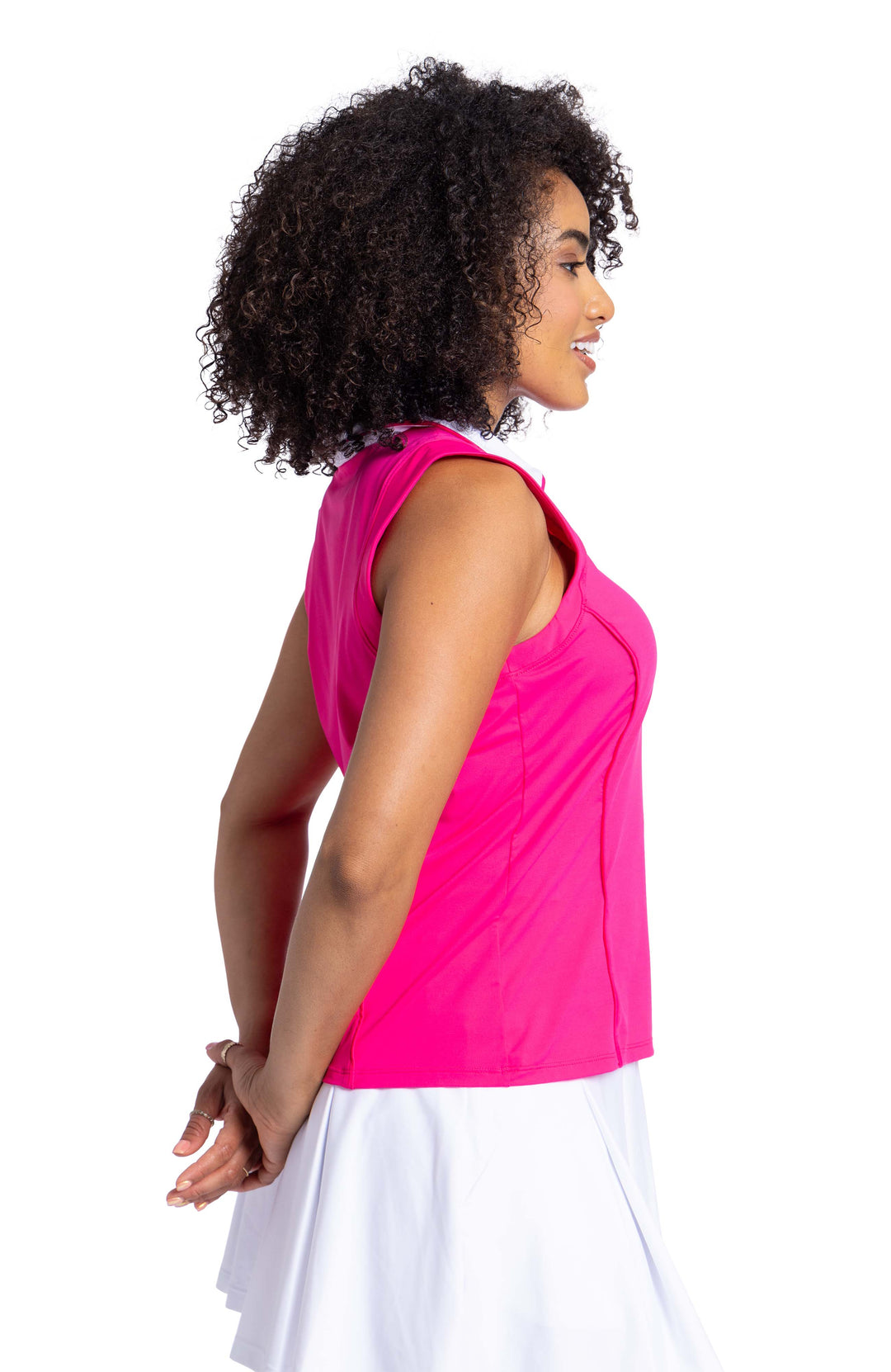 Back view of TWILIGHT SLEEVELESS GOLF TOP - PREPPY PINK with white pleated skort