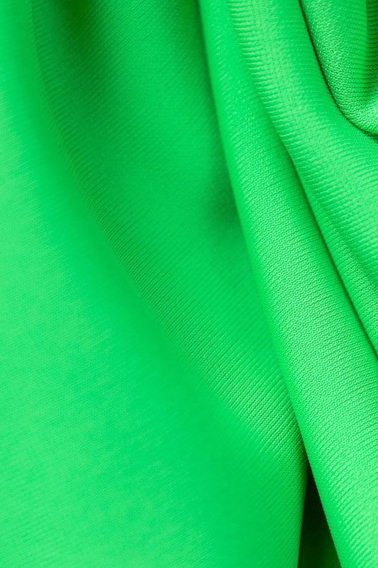 Color sample - Kelly Green. This is the color on the Victory Sleeveless Golf Top in Kelly Green.