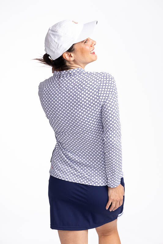 Back view of the Keep It Covered Long Sleeve Golf Top in Tees Please. This top features a front quarter zipper. When up, the collar stands up; lies flat when partially unzipped.