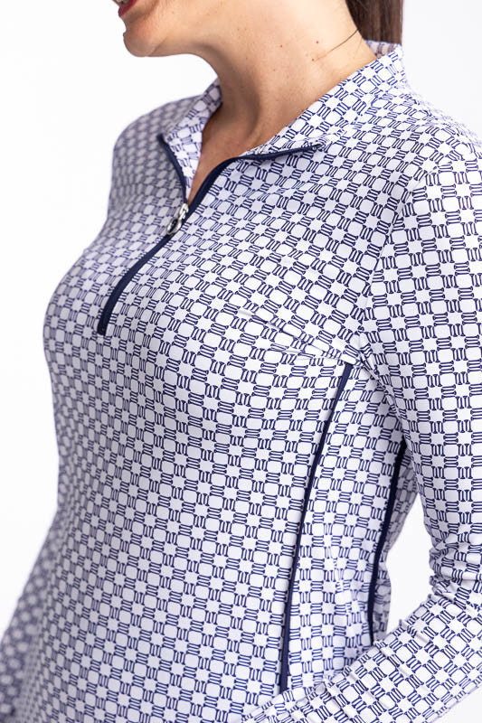 Close front and left side view of the Keep It Covered Long Sleeve Golf Top in Tees Please. This top features a front quarter zipper. When up, the collar stands up; lies flat when partially unzipped.