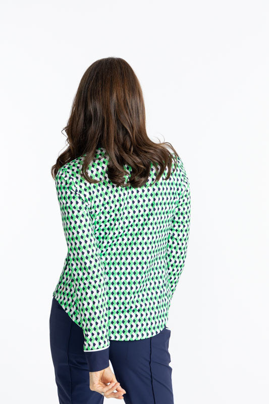 Back view of the At The Pin Long Sleeve Golf Top in Chevron Kelly Green. The collar on this top is solid navy blue as well as the cuffs on each arm of this top.