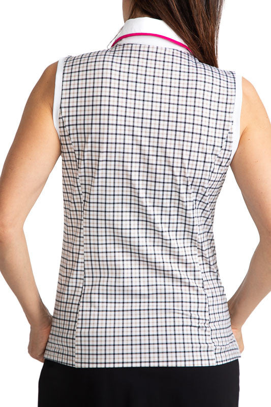 Back view of a smiling woman golfer wearing the Sun Seeker Sleeveless Golf Top in Quad Squad Print.