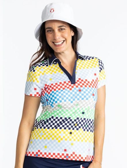 Front view of a smiling woman wearing the Big O Bucket Hat in White and the Classic and Fantastic Short Sleeve Golf Top in Cheeky Check print. This print is made up of a checked horizontal patter that creates a horizontal wrap in black, grass green, lemon