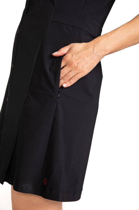 Close left side view of the pocket on the  Coming in Hot Sleeveless Golf Dress in Black.