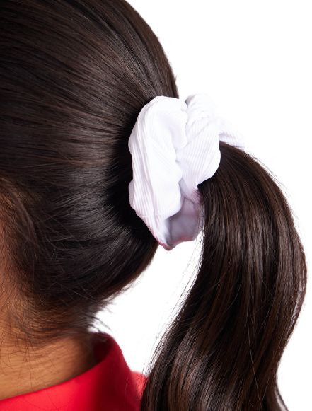Close view of the white scrunchie in the Super Scrunchie Threesome Basic Pack. It also includes one scrunchie in black and one in navy blue. 