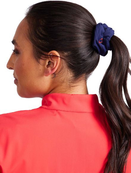 Close view of the navy blue scrunchie in the Super Scrunchie Threesome Basic Pack. It also includes one scrunchie in white and one in black. 