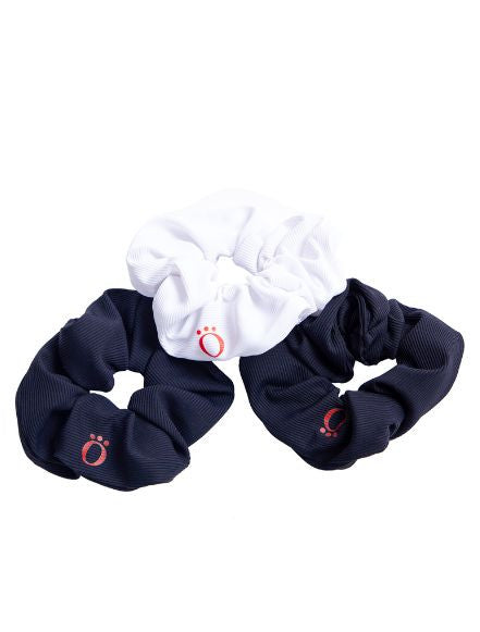 The Super Scrunchie Threesome Basic Pack includes a black, white, and navy blue scrunchie in the pack.