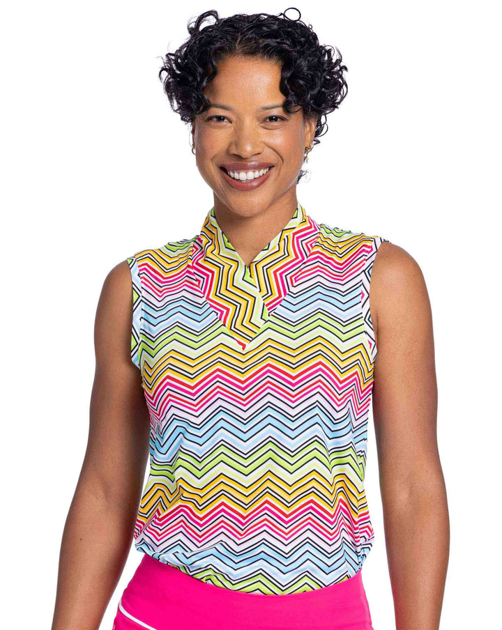 Front view of a smiling woman golfer wearing the Light and Lovely Sleeveless Golf Top in Summer Herringbone
