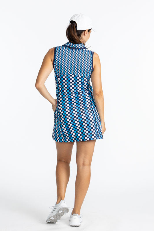 Full back view of the In The Cup Sleeveless Golf Dress in Check It Out. The check it out print consists of French blue, black, and white in a checker board print. There are also navy blue accents around the neckline, front quarter zip, and around each arm