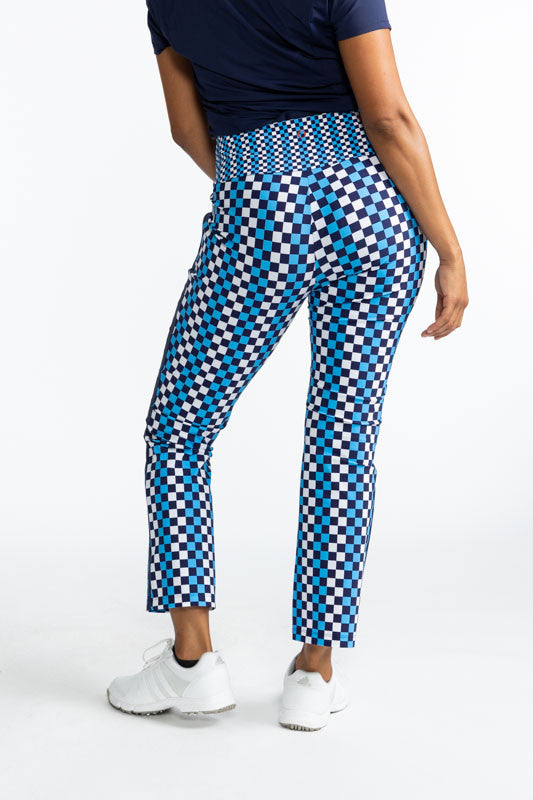 Full back view of the Smooth Your Waist Crop Pants in Check It Out print. This print consists of checks in French blue, navy blue, and white, creating vertical stripes that run the length of these pants.  A similar, smaller pattern repeats around the wais