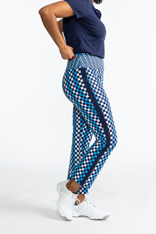 Full right side view of the Smooth Your Waist Crop Pants in Check It Out print. This print consists of checks in French blue, navy blue, and white, creating vertical stripes that run the length of these pants.  A similar, smaller pattern repeats around th