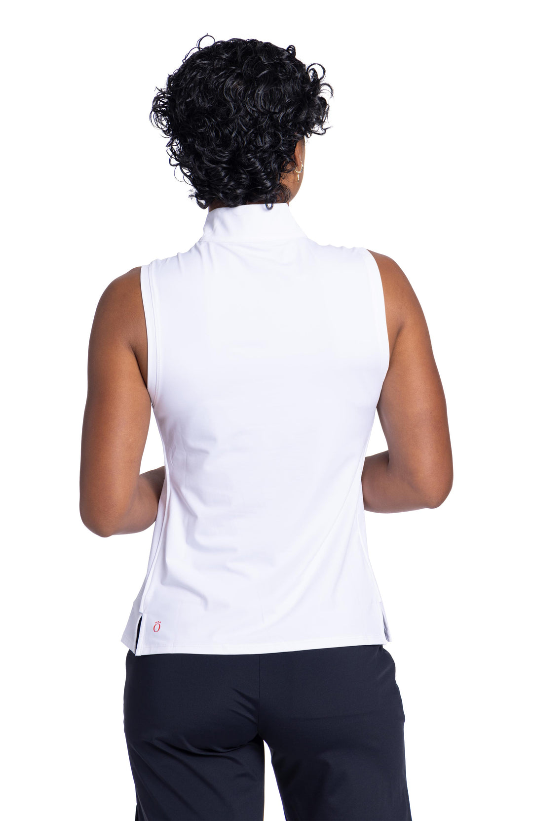 Back view of a woman wearing the white Keep It Covered Sleeveless golf top and black Golf Glove Friendly short. 