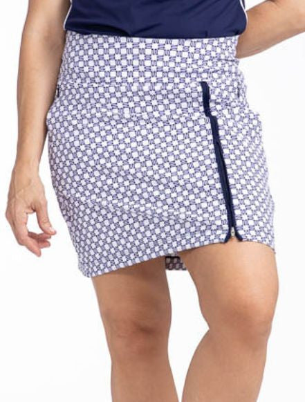 Front view of the Summer Sass Golf Skort in Tees Please. This is a navy blue and white patterned skort with a navy blue front zipper with a light layer underneath for additional room to move, two size zip pockets with built-in tee holder, a back pocket on