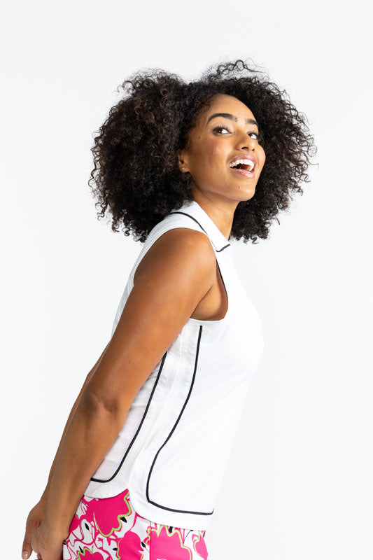 Right side view of the Bogey Round Sleeveless Golf Top in White. This top is trimmed in black around the collar and the outer edges of this top.