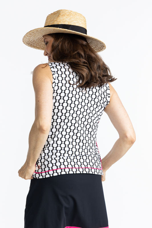 Back view of the Bogey Round Sleeveless Golf Top in Spiral Floral. This is a retro-inspired abstract floral pattern in black and white.