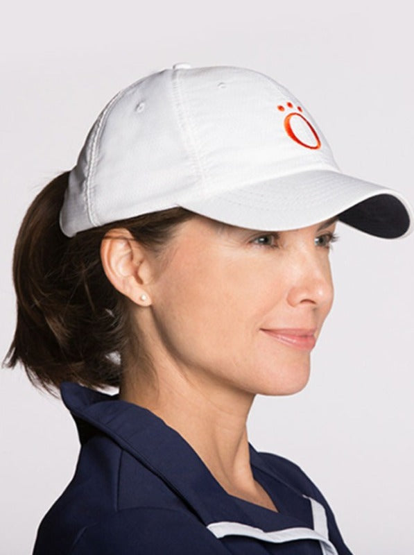 White We've Got You Covered golf baseball-style cap with Kinona logo with adjustable strap and opening for ponytail.